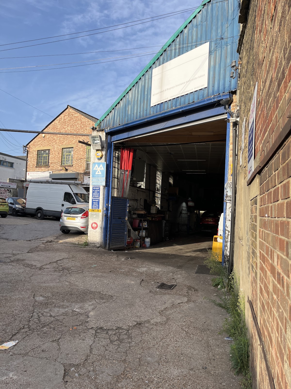 Plumstead Garages LTD — website preview in the Signature design